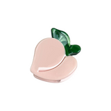 The Tiny Finch peach-shaped mini hair clip made of light pink and green acetate, measuring 3cm.