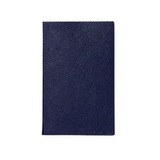 The Tiny Finch navy Panama pocket notebook in crossgrain lambskin leather with a slim, portable design.