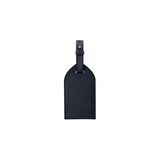The Tiny Finch navy crossgrain leather luggage tag with an adjustable strap and tonal topstitching.