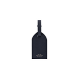 The Tiny Finch Smythson navy crossgrain leather luggage tag with adjustable strap and gold logo detail