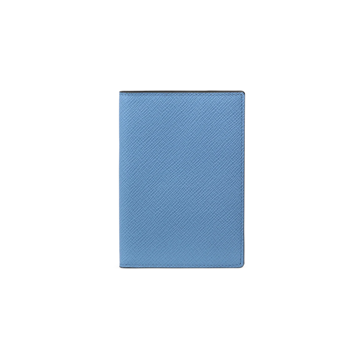The Tiny Finch blue crossgrain leather passport cover with a textured finish and slim travel design.