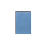 The Tiny Finch blue crossgrain leather passport cover with a textured finish and slim travel design.