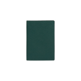 The Tiny Finch forest green crossgrain leather passport cover with a textured finish.