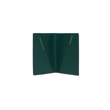 The Tiny Finch forest green crossgrain leather passport cover with interior pockets for passport and boarding pass.