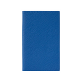 The Tiny Finch cerulean blue Panama pocket notebook bound in textured crossgrain lambskin leather.