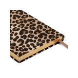 The Tiny Finch Soho notebook in leopard print cross grain calf skin leather with gilt-edged pages and ribbon marker.
