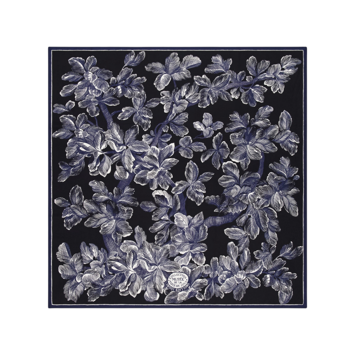 The Tiny Finch Square Arboris Blue wool scarf featuring a detailed white tree engraving on a dark blue background.