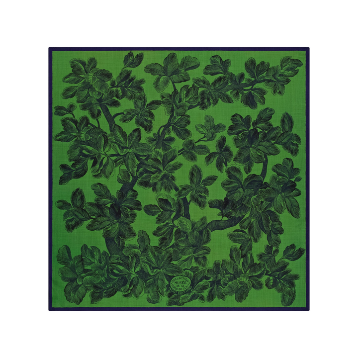 The Tiny Finch Arboris square wool scarf in green featuring a detailed black tree engraving inspired by Toile de Jouy.
