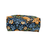 The Tiny Finch Morris cosmetic bag in navy fabric with intricate bird and floral print in yellow, green, and blue.