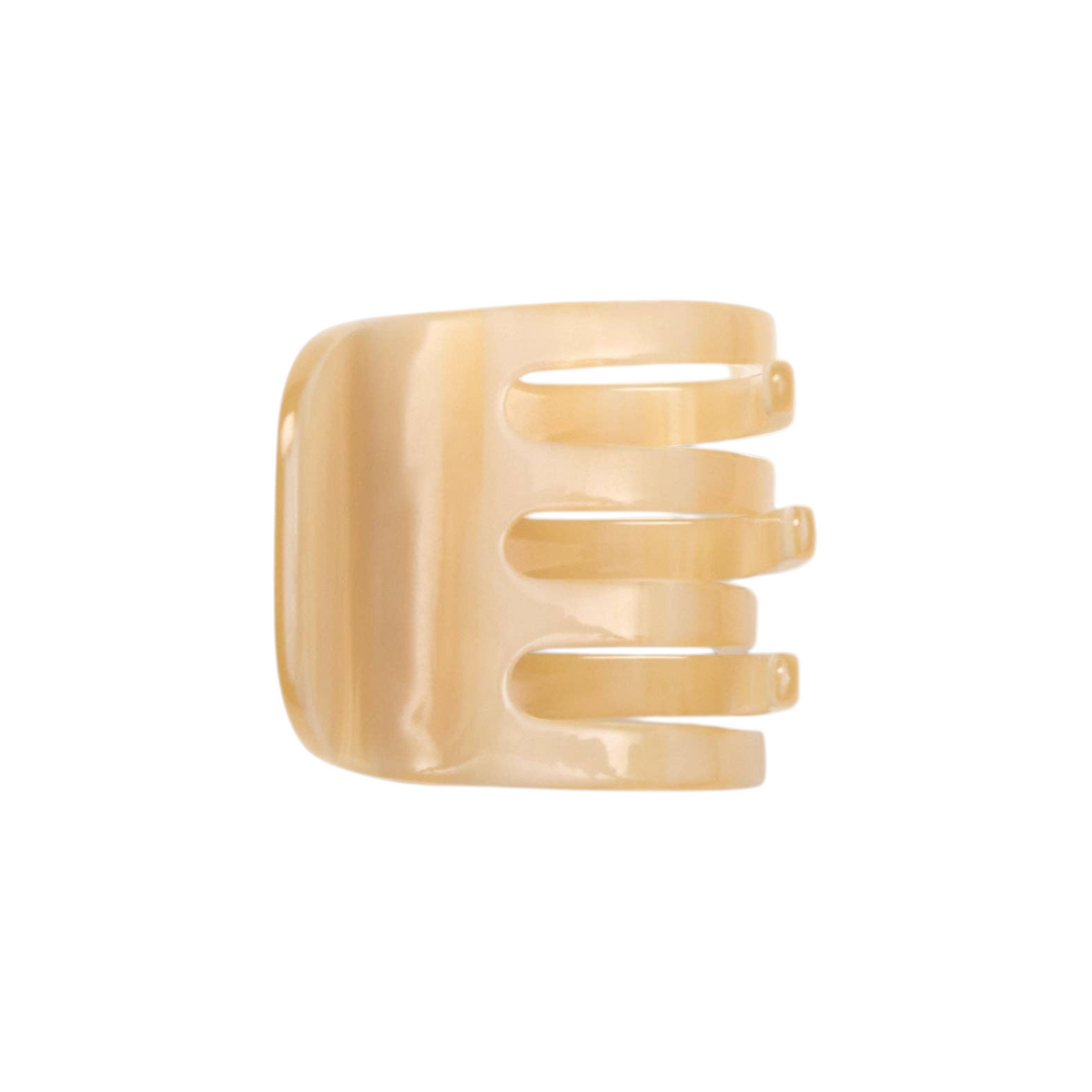 The Tiny Finch mini hair claw clip in a translucent chamois beige Italian bio-acetate finish.