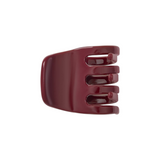 The Tiny Finch handcrafted mini hair claw clip in oxblood Italian bio-acetate for all hair types.