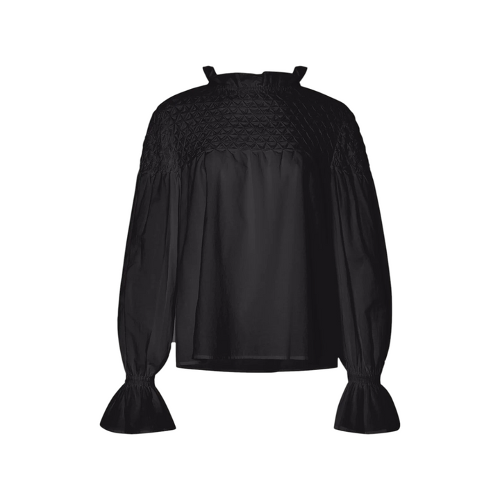 The Tiny Finch Merlette Majorelle black Pima cotton blouse with hand-smocked yoke and ruffled collar and cuffs.