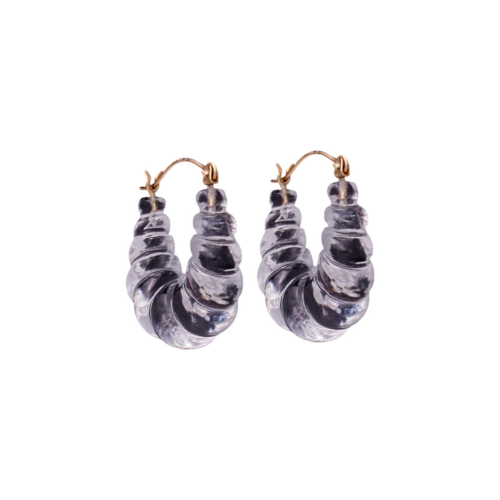 The Tiny Finch handmade crystal carved stone hoop earrings with 14K gold ear wires on a black background.