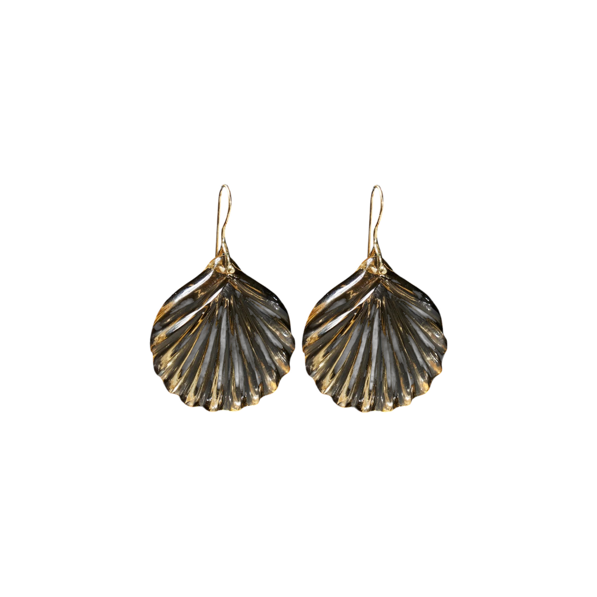 The Tiny Finch citrine fan earrings featuring carved stone on 18k gold stirrup wires against a black background.