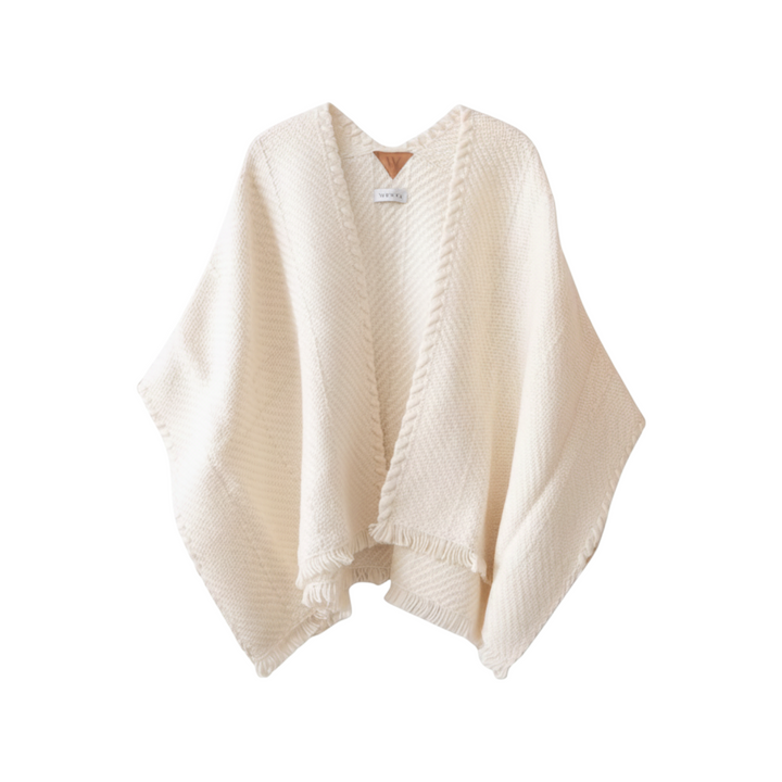 The Tiny Finch ivory handwoven merino wool and Tencel cardigan with fringe and whipstitch detailing