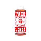 The Tiny Finch Paco Mexican Ketchup bottle with red and white label featuring smoky chipotle and agave ingredients.