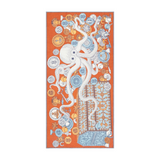 The Tiny Finch orange cotton and silk scarf featuring a white octopus illustration surrounded by treasure motifs.