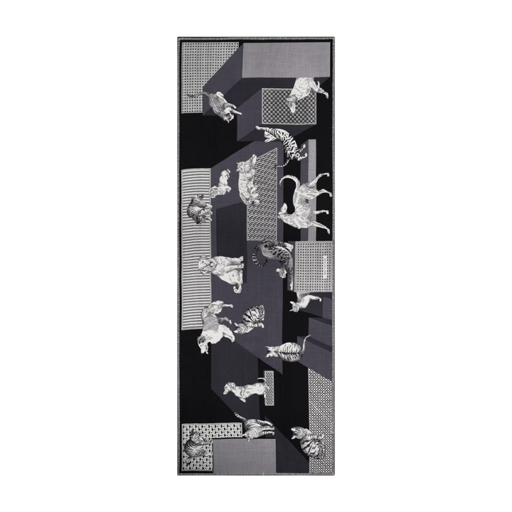 The Tiny Finch Le Cheris black wool scarf featuring a geometric pattern with illustrated cats and dogs.