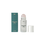 The Tiny Finch Mother Mother magnesium oil roll-on with a rose quartz roller, aloe, and glycerin in a glass bottle.