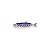 The Tiny Finch blue and white fish-shaped hair claw clip made from durable cellulose acetate.