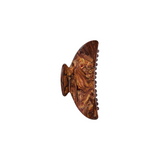 The Tiny Finch midi hair claw clip in bronze Italian acetate with a marbled swirl pattern and reinforced hardware.