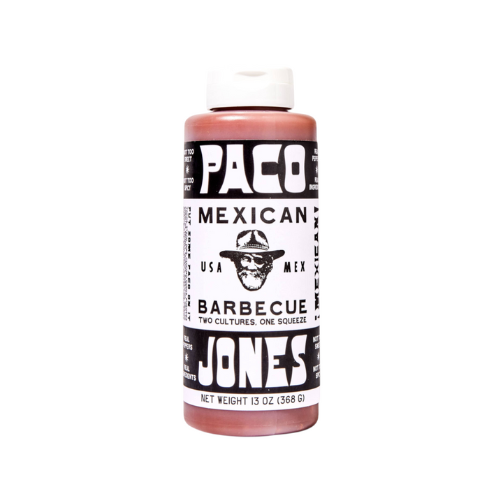 The Tiny Finch Paco Jones Mexican barbecue sauce in a 13oz bottle with a fruit-forward, chile-infused red sauce.