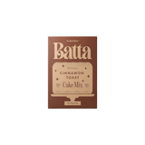 The Tiny Finch Batta Cinnamon Toast cake mix box in brown packaging with elegant typography on a solid brown background