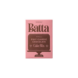 The Tiny Finch Batta Cult Classic Chocolate cake mix box in pink packaging on a matching pink background.