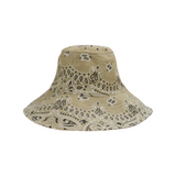 The Tiny Finch beige cotton capeline hat featuring a black and white paisley bandana print and wide brim