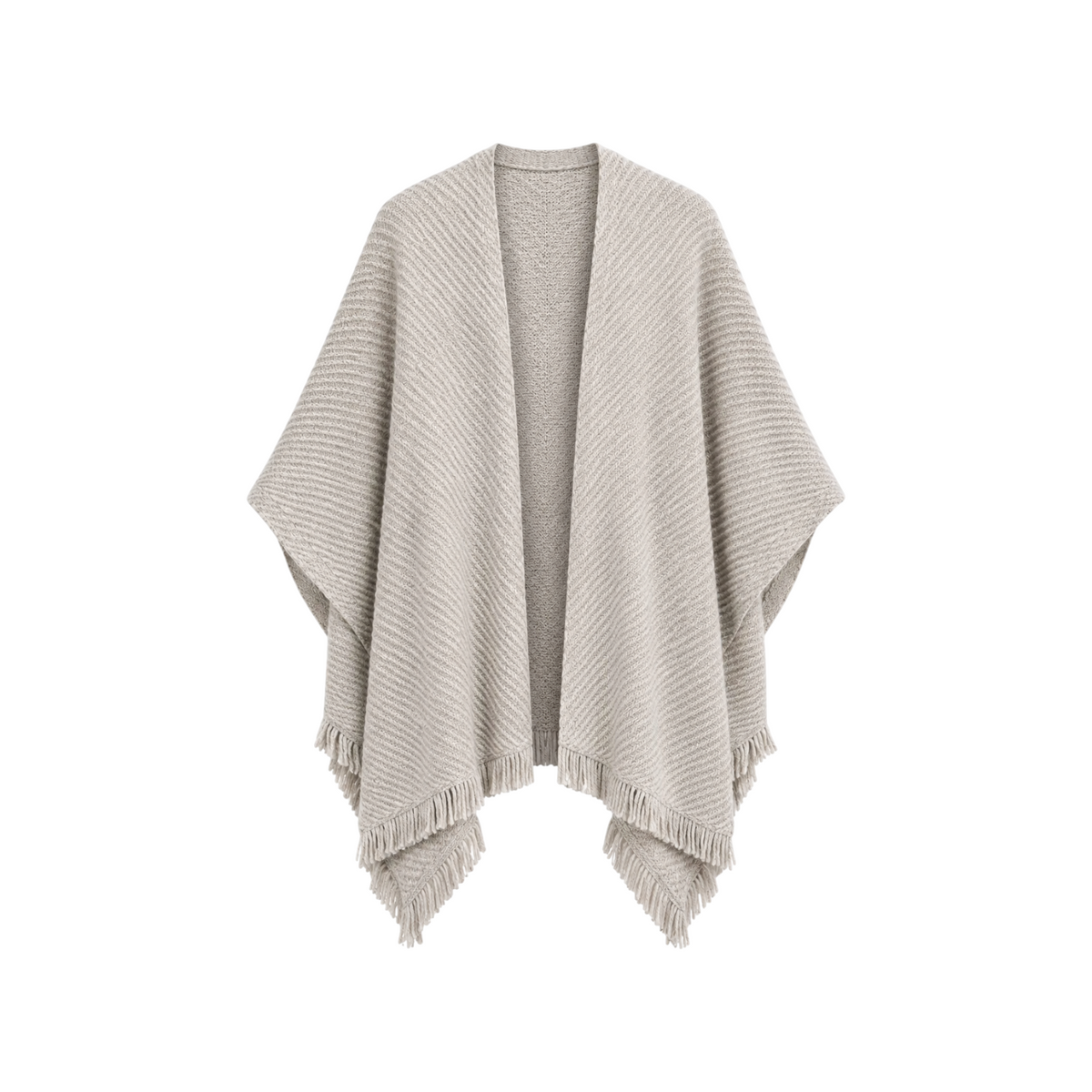 The Tiny Finch Cape Sand is a beige knitted open-front poncho featuring a textured ribbed pattern and fringe hem.