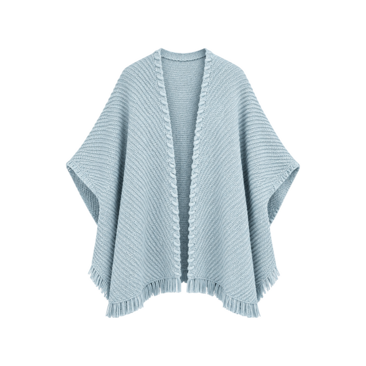 The Tiny Finch Bella cardigan in light blue chalk, handwoven from merino wool and tencel with fringe and whipstitch.