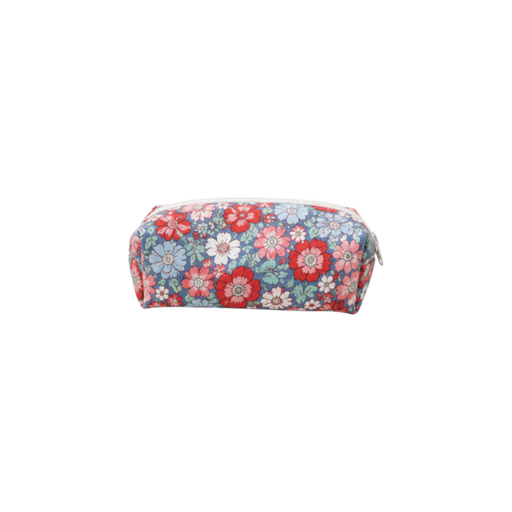 The Tiny Finch Poppy mini cosmetic bag in blue and pink quilted Liberty of London floral fabric with a zip closure.