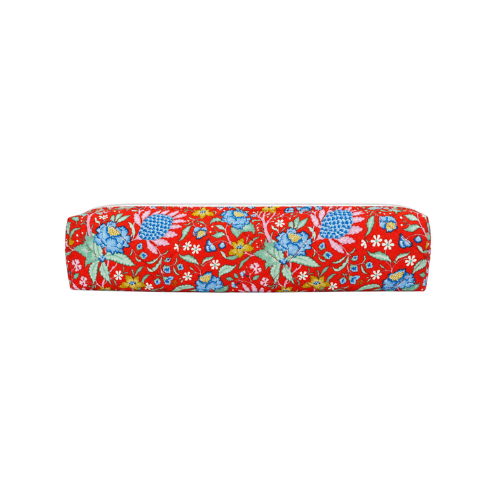 The Tiny Finch Persimmon hair tools bag in a vibrant red floral print, designed for straighteners and curlers.