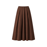 The Tiny Finch Moismont Paule N 836 long brown cotton twill skirt with an elastic drawstring waist and pleated design.
