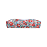 The Tiny Finch Poppy Hair Tools Bag in a regular size featuring a vibrant blue floral print with red and pink flowers.