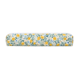 The Tiny Finch Daisy Fields large hair tools bag featuring a floral print with yellow daisies on a white background.