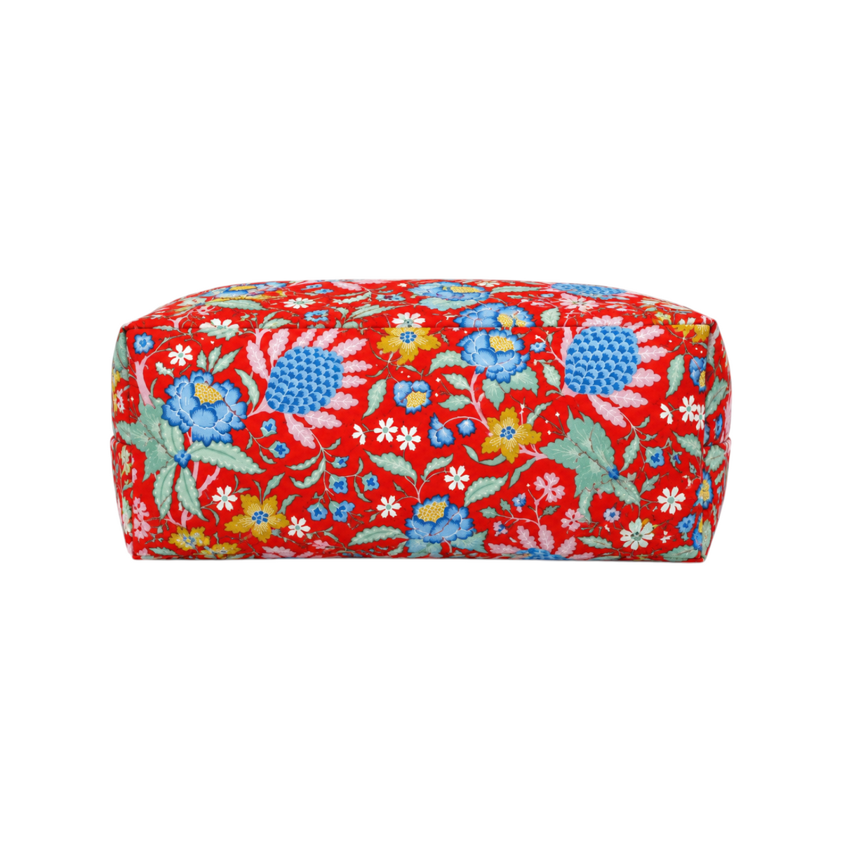 The Tiny Finch Persimmon quilted cosmetic bag in orangey-red with a vibrant blue, green, and white floral print.