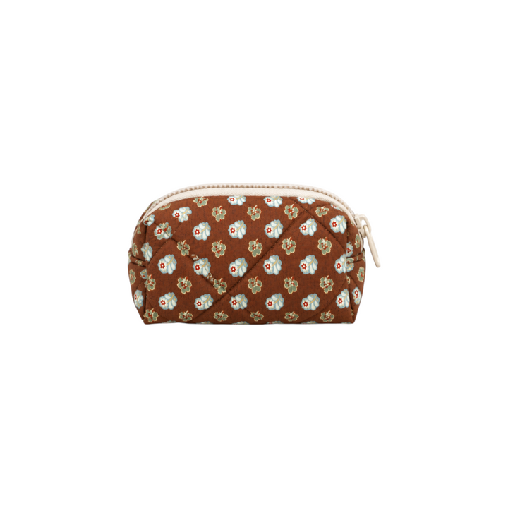 The Tiny Finch Georgia mini cosmetic bag in brown floral quilted fabric with a cream zipper closure.