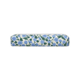 The Tiny Finch Dianthus hair tools bag in a regular size featuring a blue floral print on a cream background.