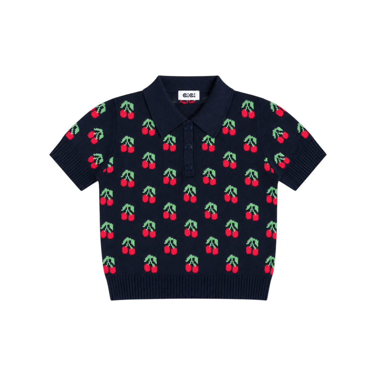 The Tiny Finch navy organic cotton polo shirt featuring a playful red cherry and green leaf knit pattern.