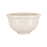 The Tiny Finch handmade cream stoneware mixing bowl with a classic farmhouse design and embossed logo