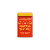 The Tiny Finch Diaspora Co. Garam Masala spice blend in a vibrant red and yellow rectangular tin container.