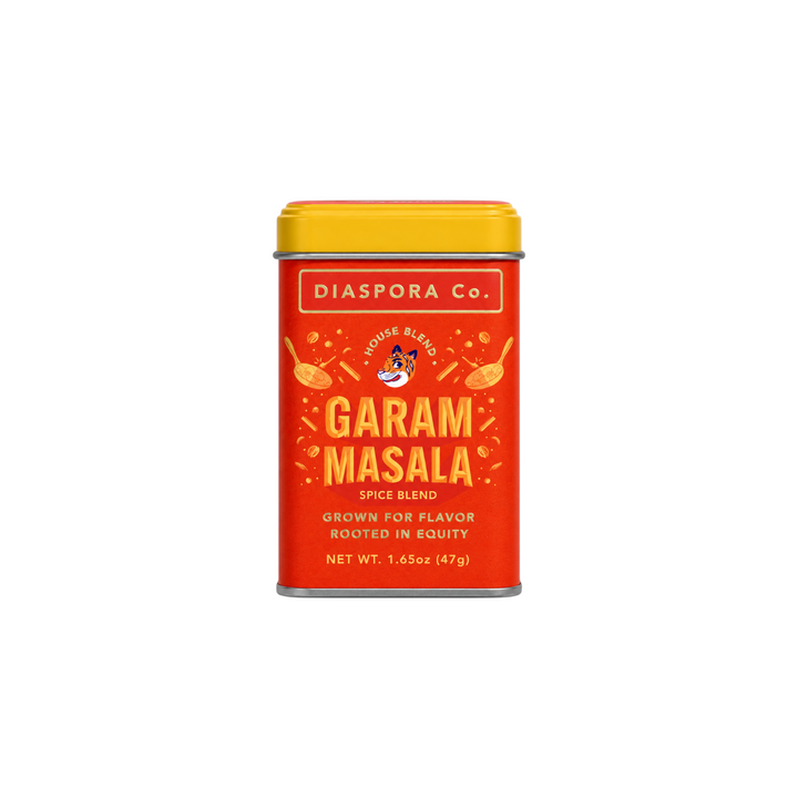 The Tiny Finch Diaspora Co. Garam Masala spice blend in a vibrant red and yellow rectangular tin container.