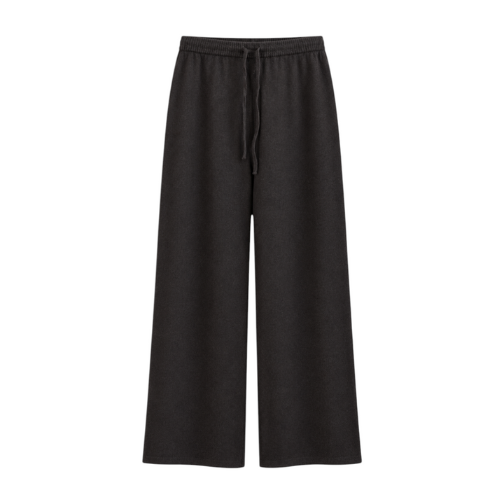 The Tiny Finch Brontie Coco wide-leg sweatpants in charcoal grey with an elastic drawstring waistband.