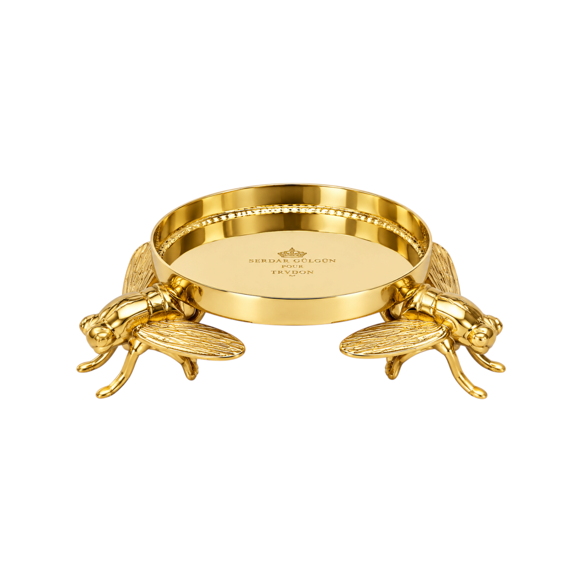 The Tiny Finch Bee Candle Pedestal in polished bronze featuring detailed bee motifs for Trudon classic candles.