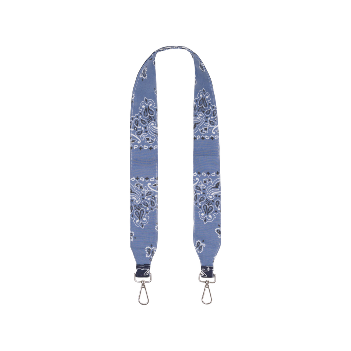 The Tiny Finch chambray purse strap featuring a blue paisley bandana print with silver metal swivel clasps.