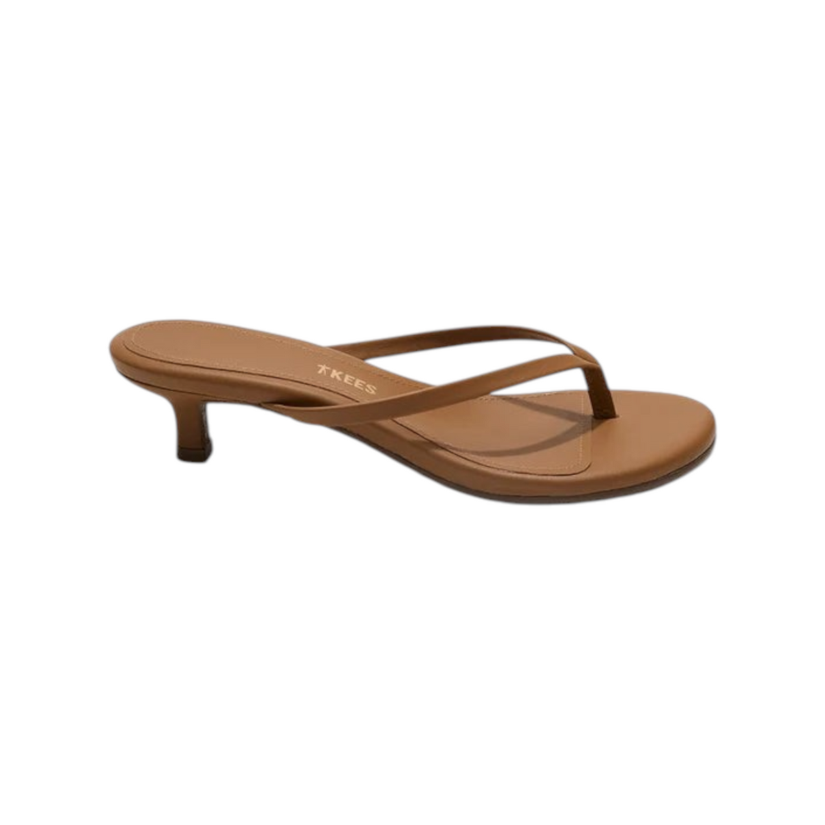 The Tiny Finch Julia camel matte leather kitten heel thong sandal with a one-inch heel and rubber outsole.