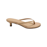 The Tiny Finch Julia kitten heel sandals in sunkissed matte leather with a minimalist thong strap and rubber outsole.