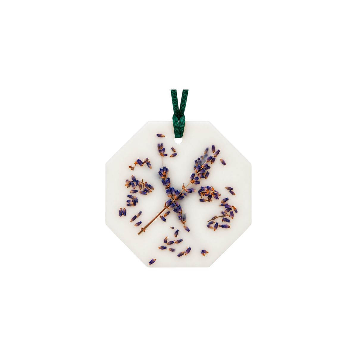 The Tiny Finch scented botanical palet featuring dried lavender flowers embedded in white vegetable wax with green ribbon