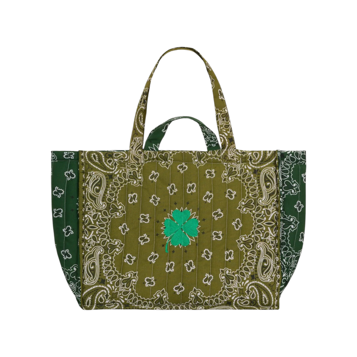 The Tiny Finch Call It By Your Name bronze quilted tote with green clover embroidery and paisley bandana print.
